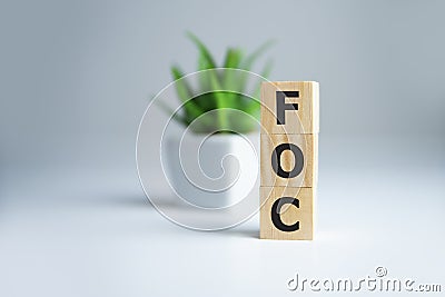 Alphabet letter in word FOC Abbreviation of Free of charge on white background Stock Photo