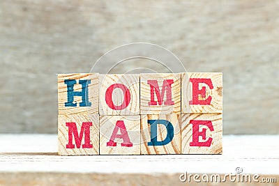 Alphabet in word homemade on wood background Stock Photo