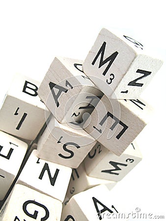 Alphabet made out of wooden cubes Stock Photo