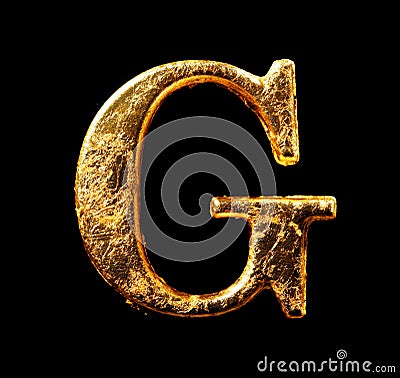 Alphabet and numbers in gold leaf Stock Photo