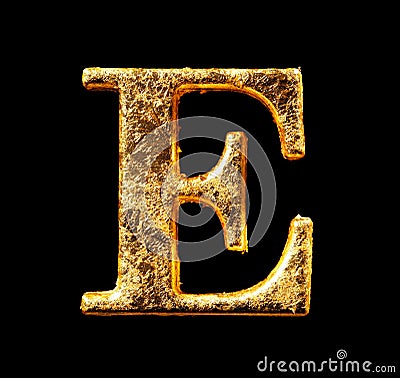 Alphabet and numbers in gold leaf Stock Photo