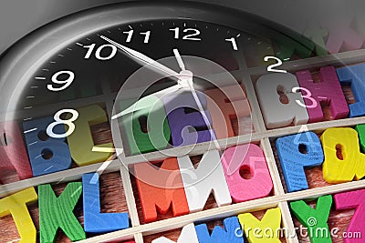 Alphabets and Clock Stock Photo