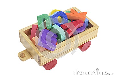 Alphabets on Wooden Toy Cart Stock Photo