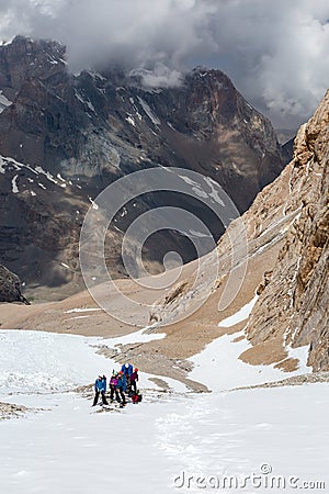 Alpine Climbers on Snowfield Stock Photo