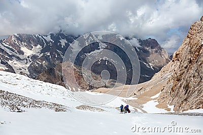 Alpine Climbers on Snowfield Stock Photo