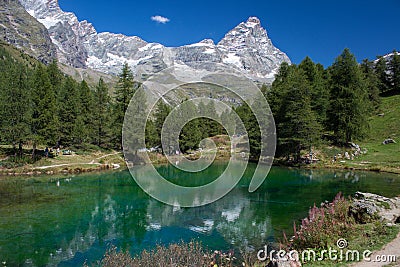 Alpine lake reflection Stock Photo