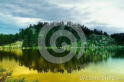 An alpine lake in stillness Stock Photo