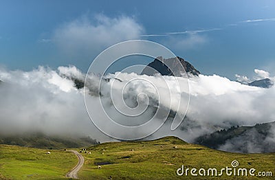 alpine landscape in the mountains near kaprun with peak covered in the clouds Stock Photo