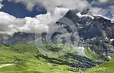 Alpine mountain landscape with beautiful sky, Grindelwald - Switzerland Stock Photo