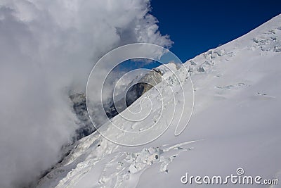 Alpinist attempting the Montblanc summit in the Alps Stock Photo