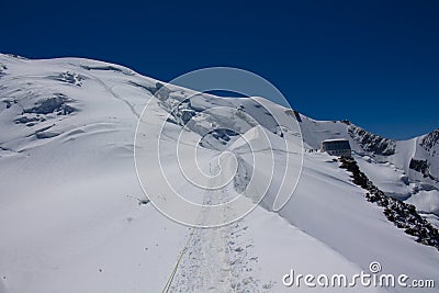 Alpinist attempting the Montblanc summit in the Alps Stock Photo