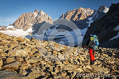 Alpinist looking at mountains ridge view Stock Photo