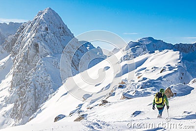 Alpinist on the ridge Stock Photo