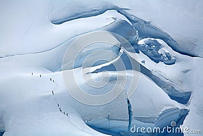 Alpinists on a glacier Stock Photo