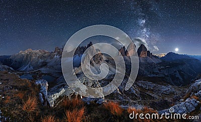 Alps Mountain landscape with night sky and Mliky way, Tre Cime d Stock Photo