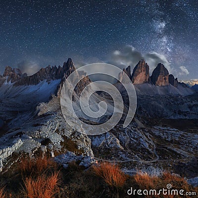 Alps Mountain landscape with night sky and Mliky way, Tre Cime d Stock Photo