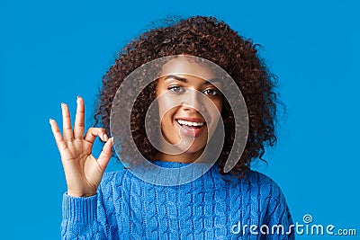 Alright, all great. Satisfied good-looking african-american female customer, rate good service, give positive feedback Stock Photo