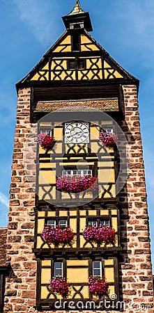 The tower of the church of the village of Riquewhir, in Alsace, France Stock Photo