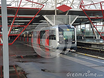 Alstom Metropolis metro street car on line 50 at th amsterdam network at station Duivendrecht Editorial Stock Photo