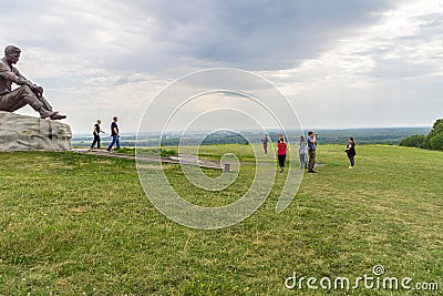 Altai, Russia - 2019, visitors to the monument to Vasily Shukshin on Mount Picket Editorial Stock Photo