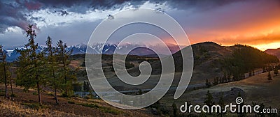 Altai, Ukok plateau. Beautiful sunset with mountains in the background. Snowy peaks autumn. Journey through Russia, Altay Stock Photo