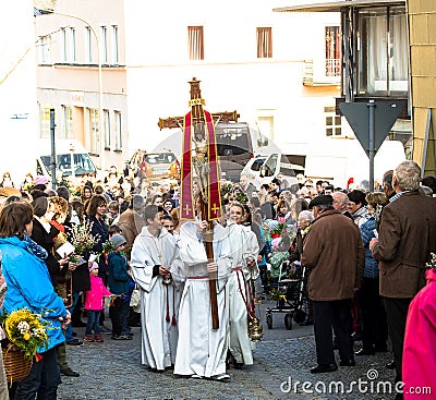 Altar boys walk at the head of the Palm Sunday procession Editorial Stock Photo