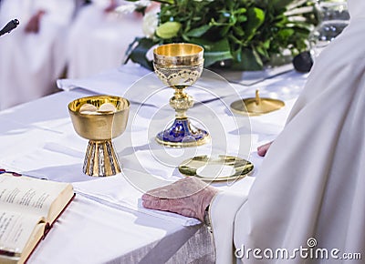 Altar with host and chalice with wine in the churches of the pope of rome, francesco Stock Photo