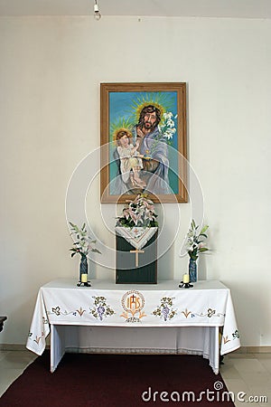 Altar of Saint Joseph in the church of Saint Bartholomew in Hrastovica, Croatia Stock Photo