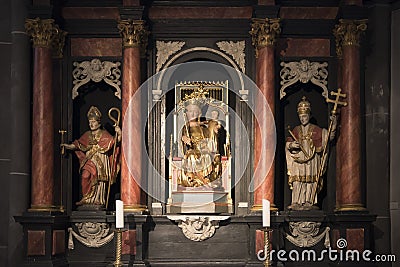 Medieval altar with Statue St. Mary and child Jesus Stock Photo