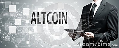 Altcoin with man holding tablet computer Stock Photo