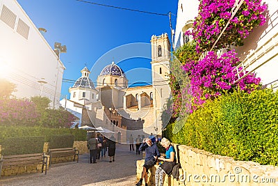 Altea, Spain. November 14, 2017: Tourists near the Church of Our Lady of Consuelo in Altea, in the province of Alicante, Spain. Editorial Stock Photo