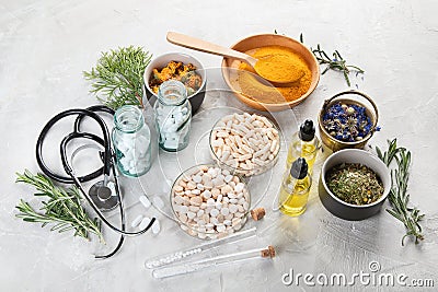 Alternative medicine herbs and homeopathic globules Stock Photo