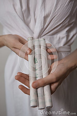 A woman hold Moxa stick. Stock Photo