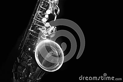 Alto saxophone in the dark black and white Stock Photo