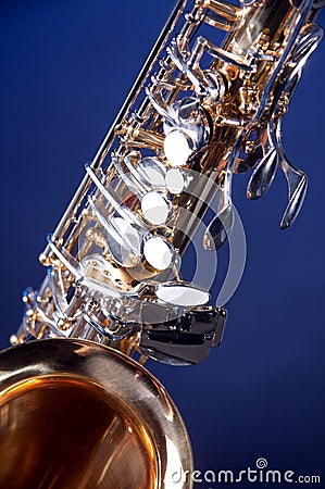 Alto Saxophone Isolated on Blue Stock Photo