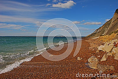 Alum Bay with red pebbles sand in Isle of Wight Stock Photo