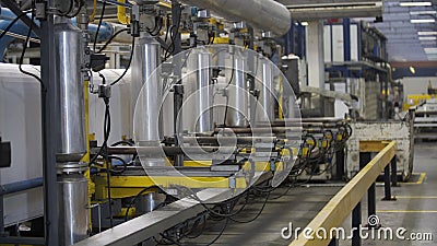 Aluminium extrusion production line factory. Production of Complex lightweight extruded aluminium metal profiles Stock Photo