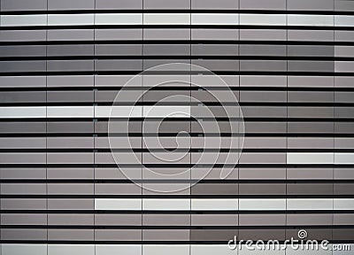 Aluminium metal facade cladding texture, with the colors white, light gray and dark gray Stock Photo