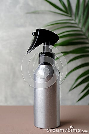 Aluminium water spray bottle with trigger mockup. Natural organic cosmetic for hair salon concept Stock Photo