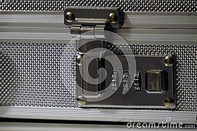 Aluminum attache case lock close up view Stock Photo