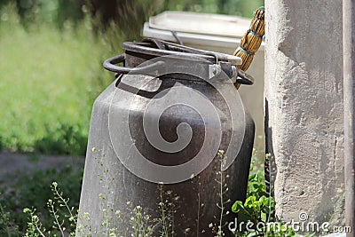 Aluminum can in the village near the wall Stock Photo