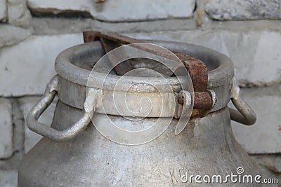 Aluminum can in the village near the wall Stock Photo