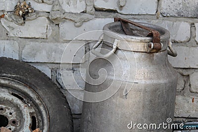 Aluminum can in the village near the wall Stock Photo