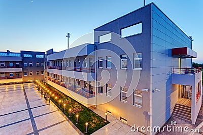 Aluminum facade on residential building at night Stock Photo