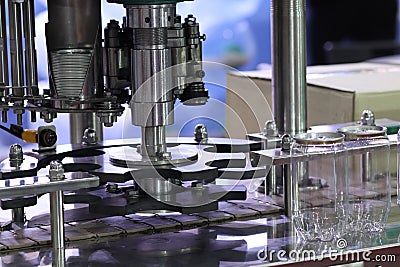 Aluminum lid packing machine for plastic can Stock Photo