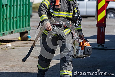 San Jose Fire Fighter on the seen during an Alviso scrap yard fire Editorial Stock Photo