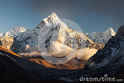 Ama Dablam 6856m peak near the village of Dingboche in the Khumbu area of Nepal, on the hiking trail leading to the Stock Photo