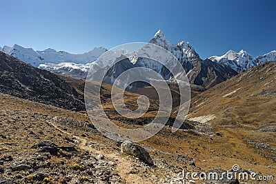 Ama Dablam mountain peak and trekking trail from Kongma la pass Stock Photo