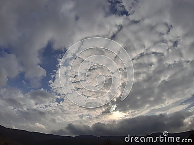 Amaizing sky theatre every day diferent view sun behind the scenes blue and white Stock Photo