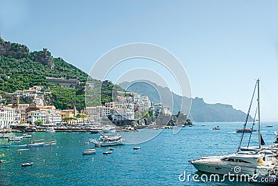 Amalfi Harbor Delights: Stunning Yachts, Ships, and Impressive Buildings, Italy Editorial Stock Photo